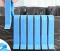 Black PP plastic garbage bag fixing clips securing a bag to a bin rim