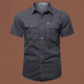 Men's short sleeve cotton work shirt in loose fit design with non-ironing treatment