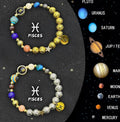 Two natural stone beaded bracelets with adjustable cords on a table, representing zodiac sign jewellery.