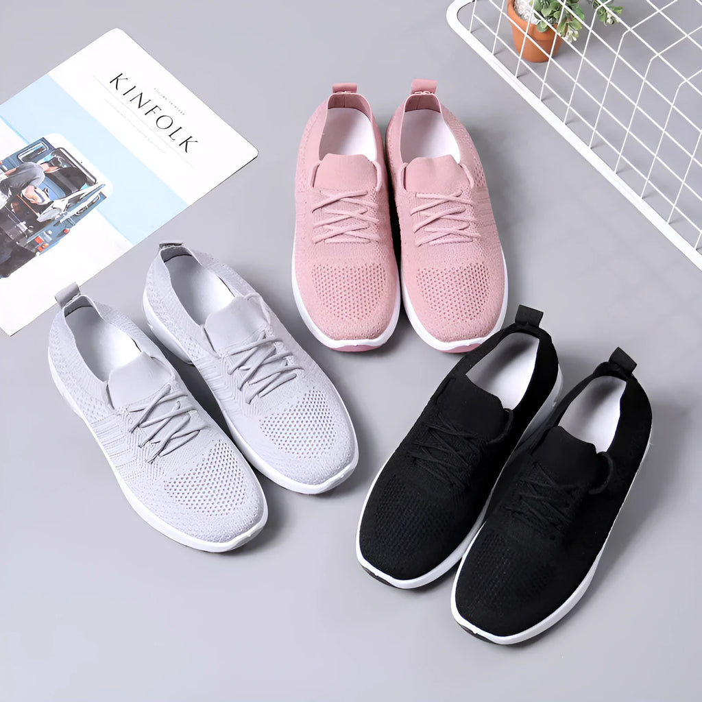 Women's black mesh casual sneaker with round toe and lace-up front on a non-slip PVC sole.