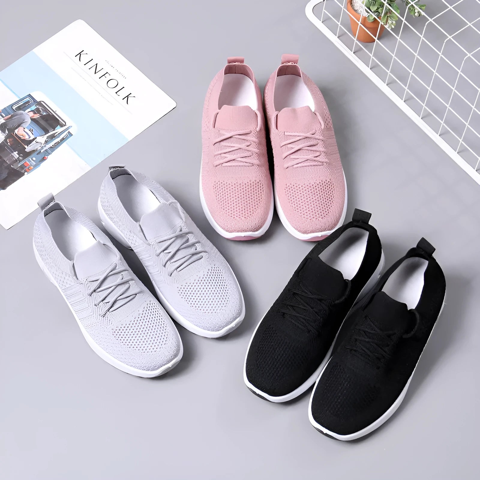 Women's black mesh casual sneaker with round toe and lace-up front on a non-slip PVC sole.
