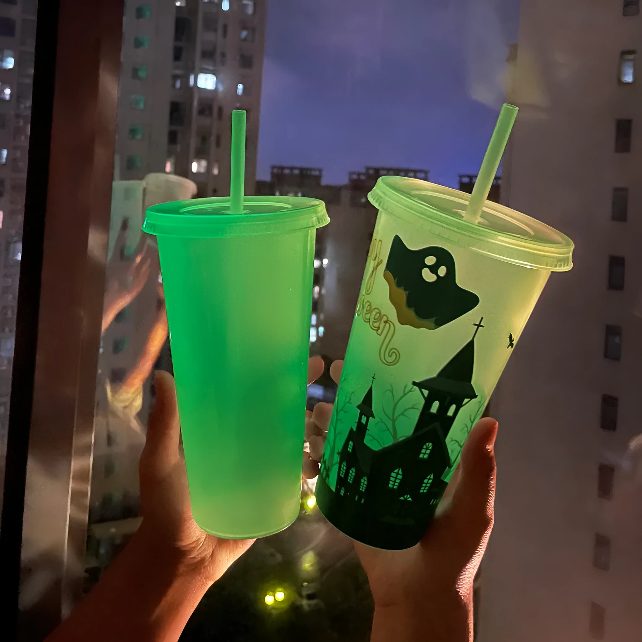 720ml luminous plastic Halloween sippy cup with a straw, cylindrical shape.