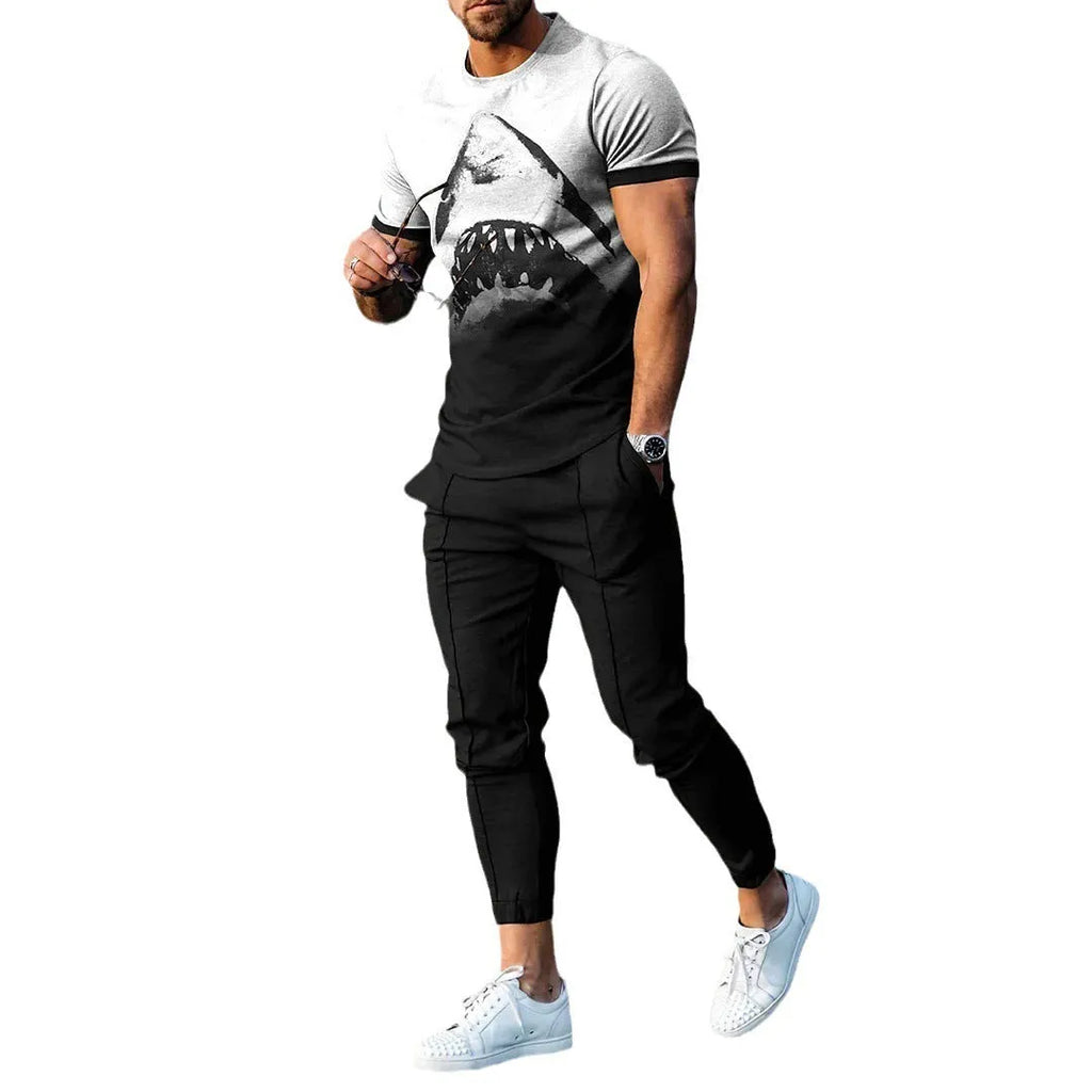 Men's short-sleeved printed sport suit set showing t-shirt and trousers in polyester blend fabric
