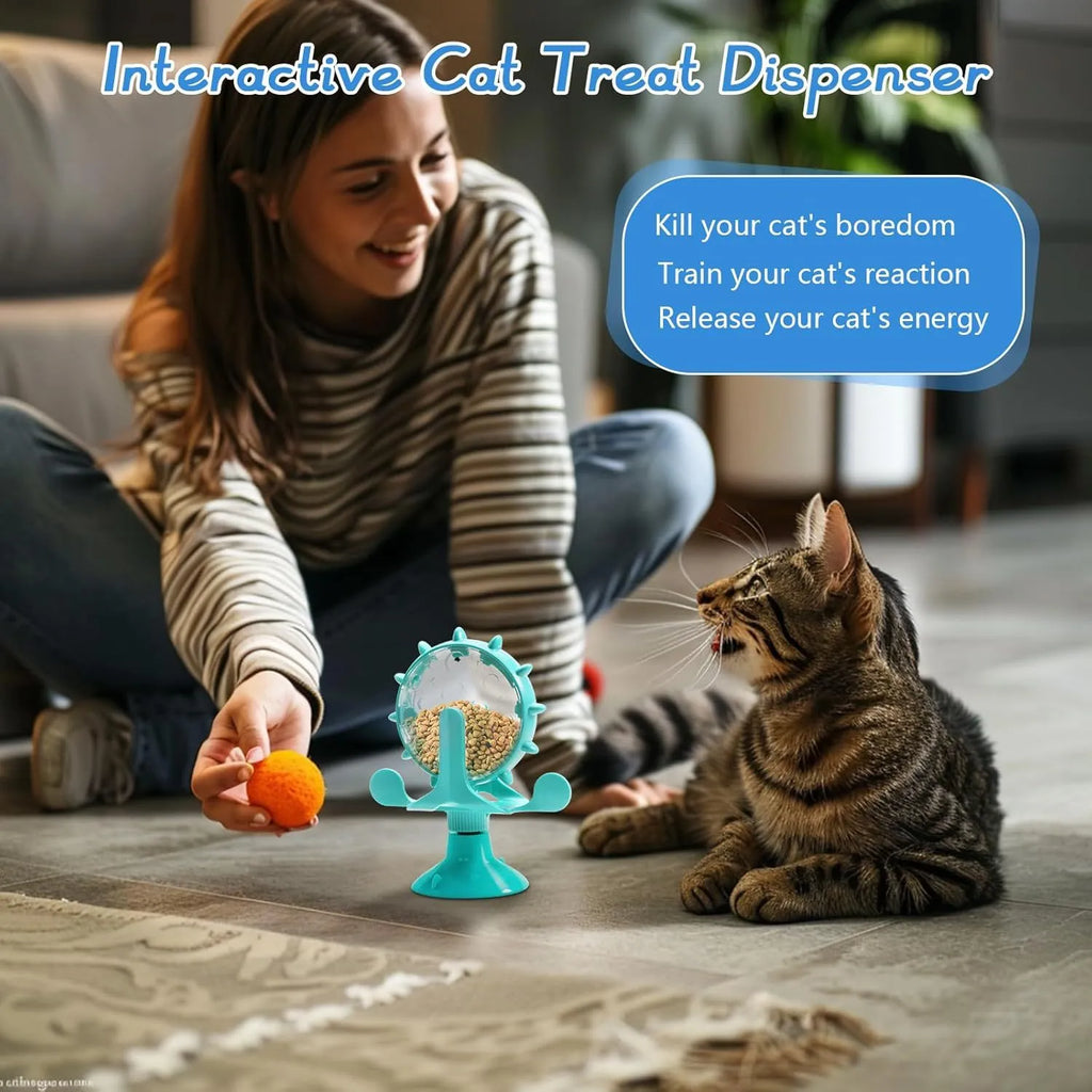 Blue interactive pet puzzle toy with spinner and suction cup base for cats and small dogs