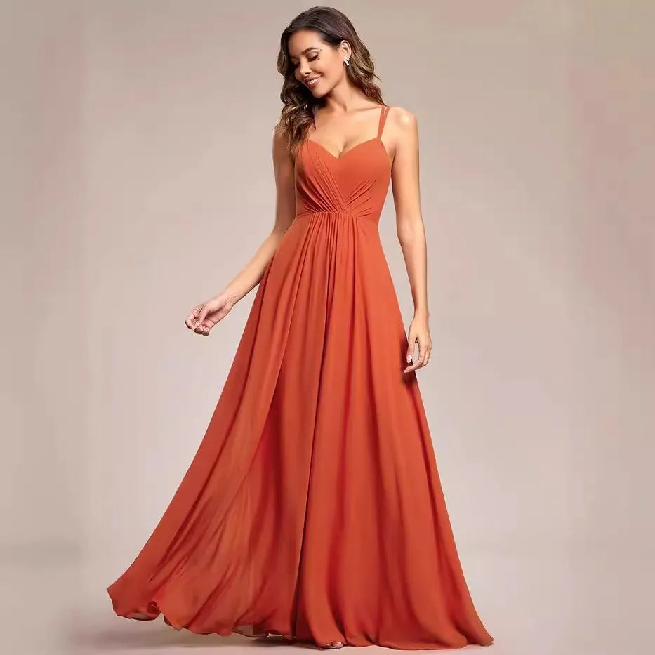 Women's long sling banquet dress with pleating detail in A-line silhouette, available in multiple colours