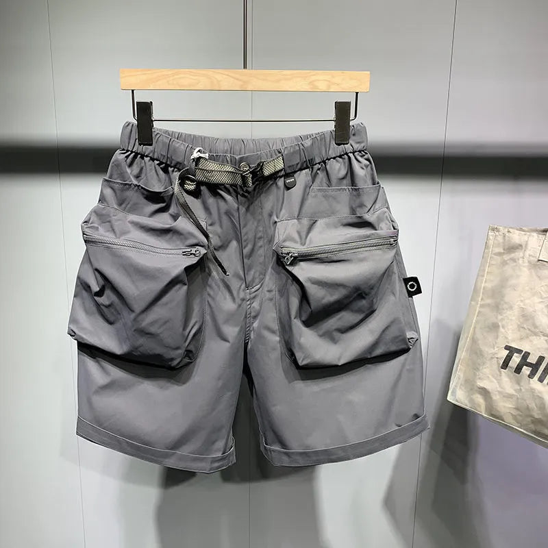 Men's large size workwear shorts in black with pockets and straight leg hem