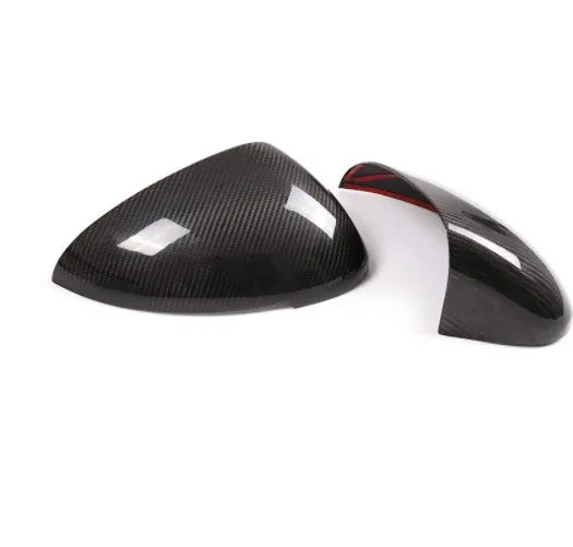 Carbon fibre rearview mirror covers for Porsche Macan with black finish and woven texture