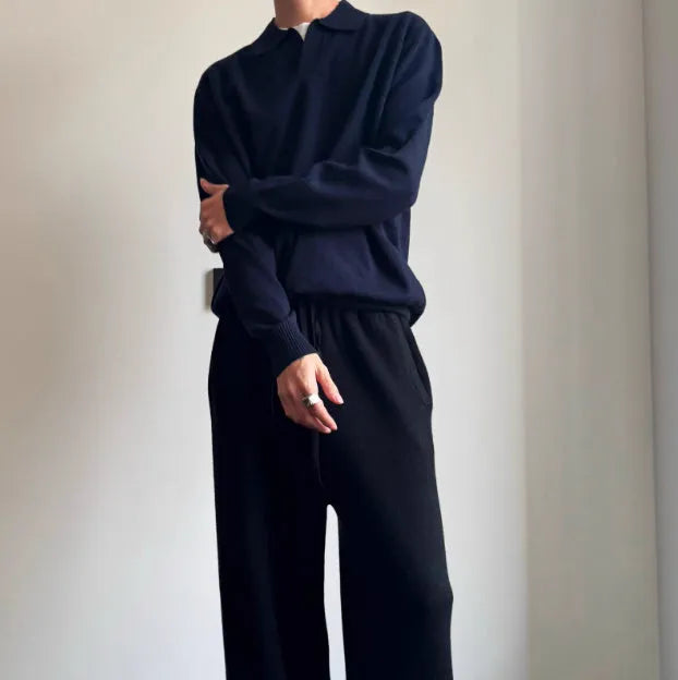 Man wearing a milky white pure wool lapel collar polo sweater with loose fit
