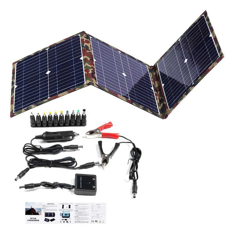 Black foldable solar panel unfolded showing three solar cells with accessories including battery clips and cables