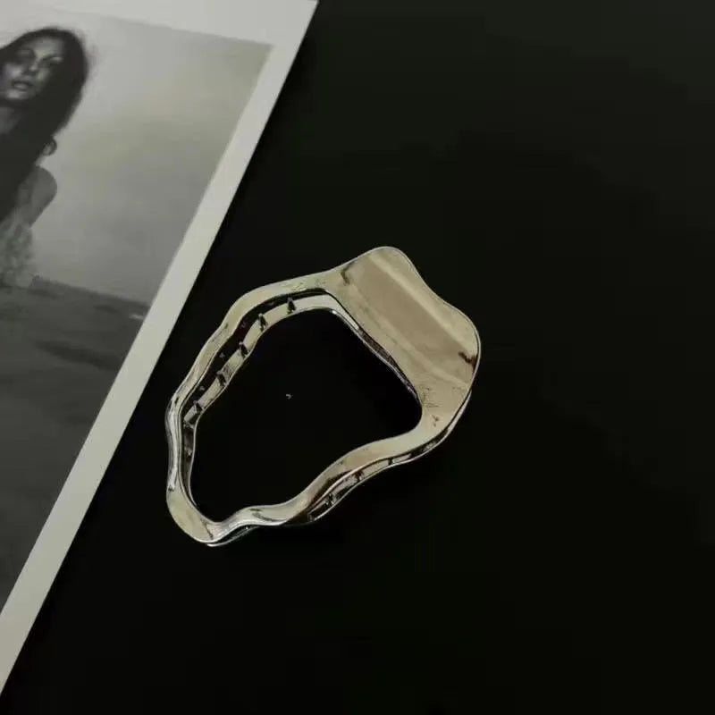 Women's zinc alloy hair barrettes in gold and silver colours showing square, arc, and triangle shapes