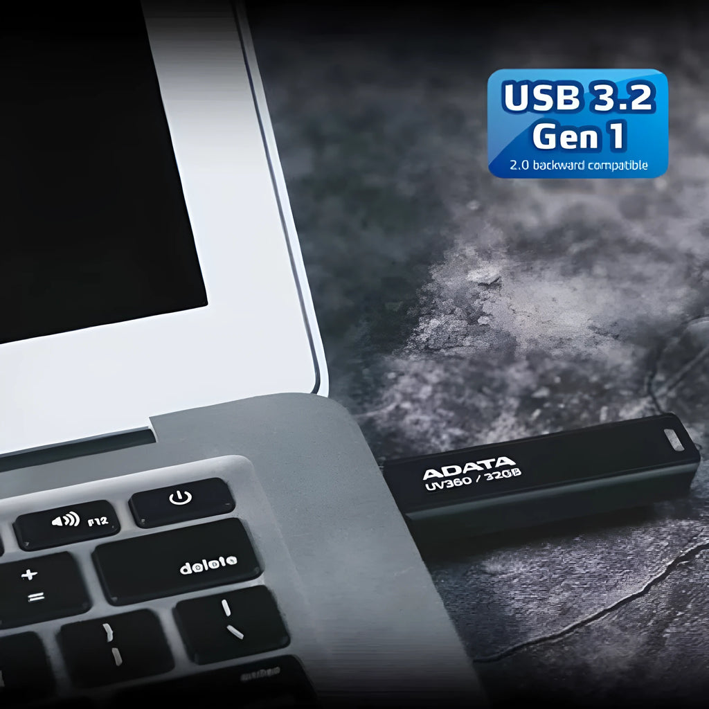 Black car-mounted USB flash drive with flexible plastic waterproof case showing size next to a ruler.