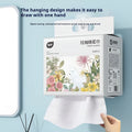 Disposable hanging roll of soft white face cloths with 100 sheets