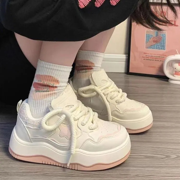 Women's green patent leather platform sneakers with lace-up front and rubber soles