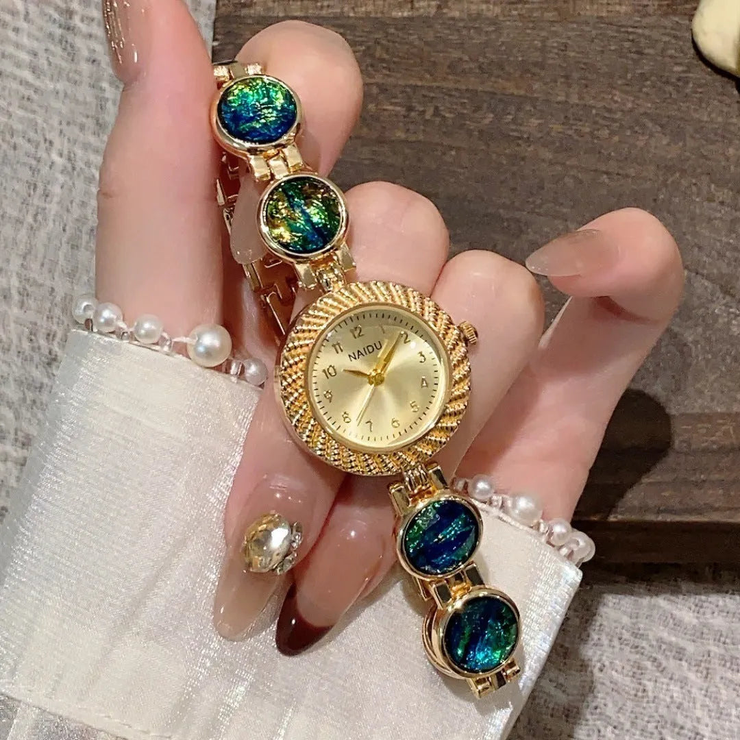 Women's round 25mm quartz watch in milky white with zinc alloy case.