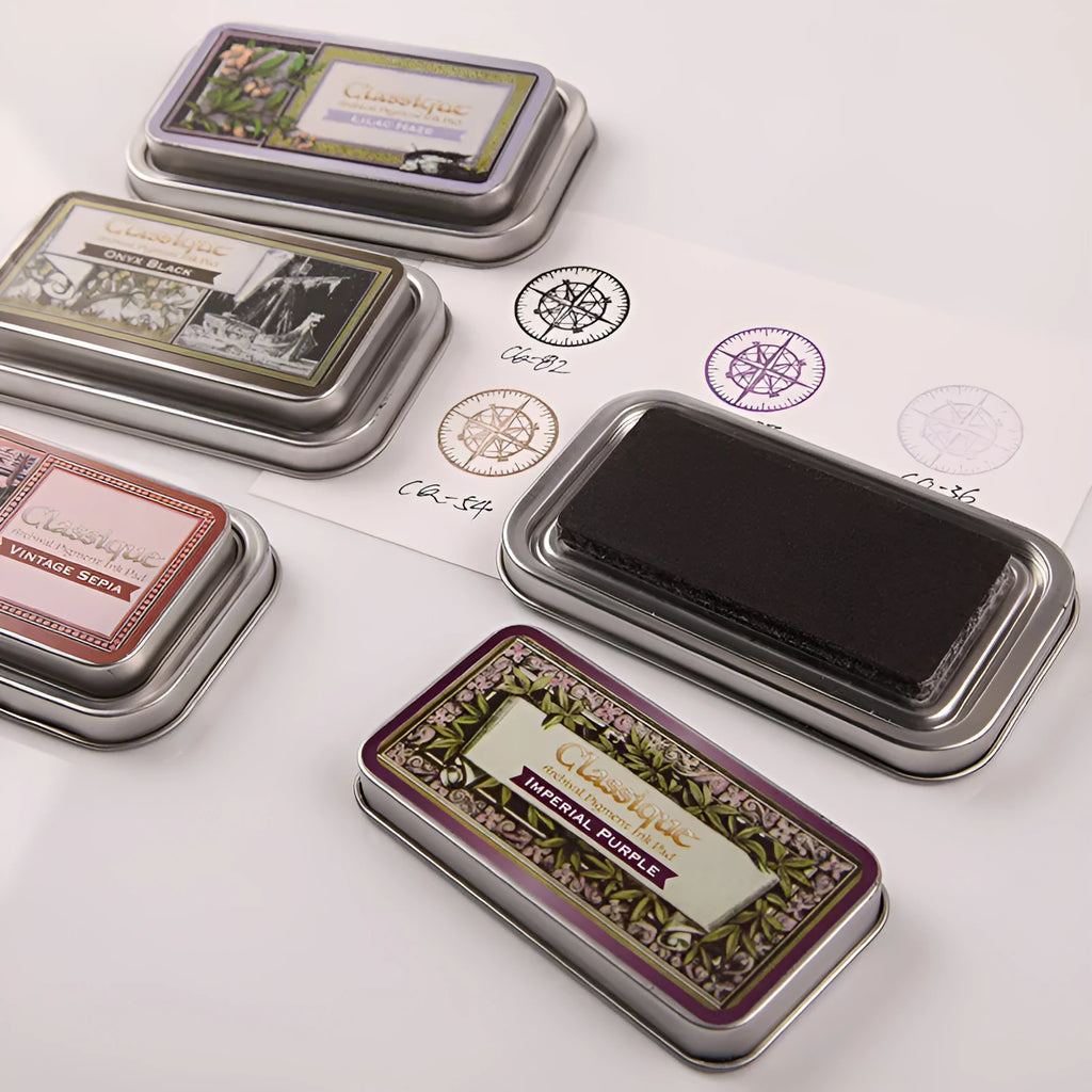 Rectangular oily ink pad for rubber stamps in five colour options measuring 0.3 x 5.7 x 1.7 cm