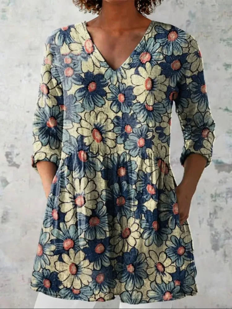 Women's retro style slim fit long-sleeved top with a printed design, shown on a hanger.