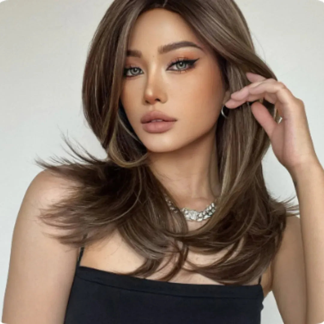 Mid-length synthetic wig with long curly hair in platinum gradient colours