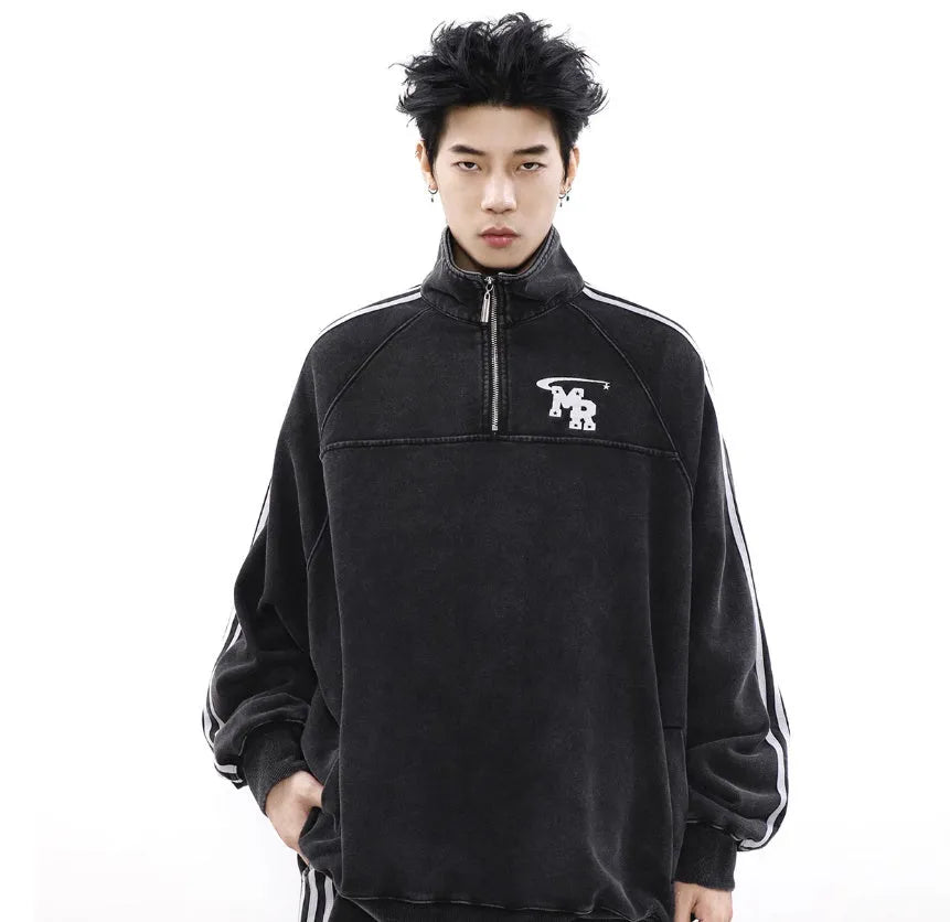 Black retro style polyester hooded sweater jacket with long sleeves on hanger