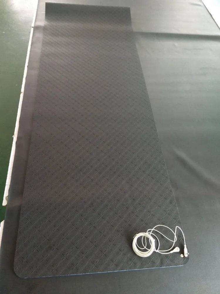 Blue conductive yoga mat with grounding wire, showing plant pattern and 182cm length.