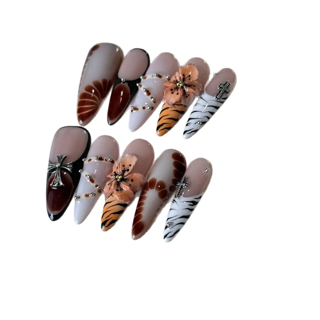 Set of 10 reusable gel nail stickers with French style leopard, cross, and flower print designs.