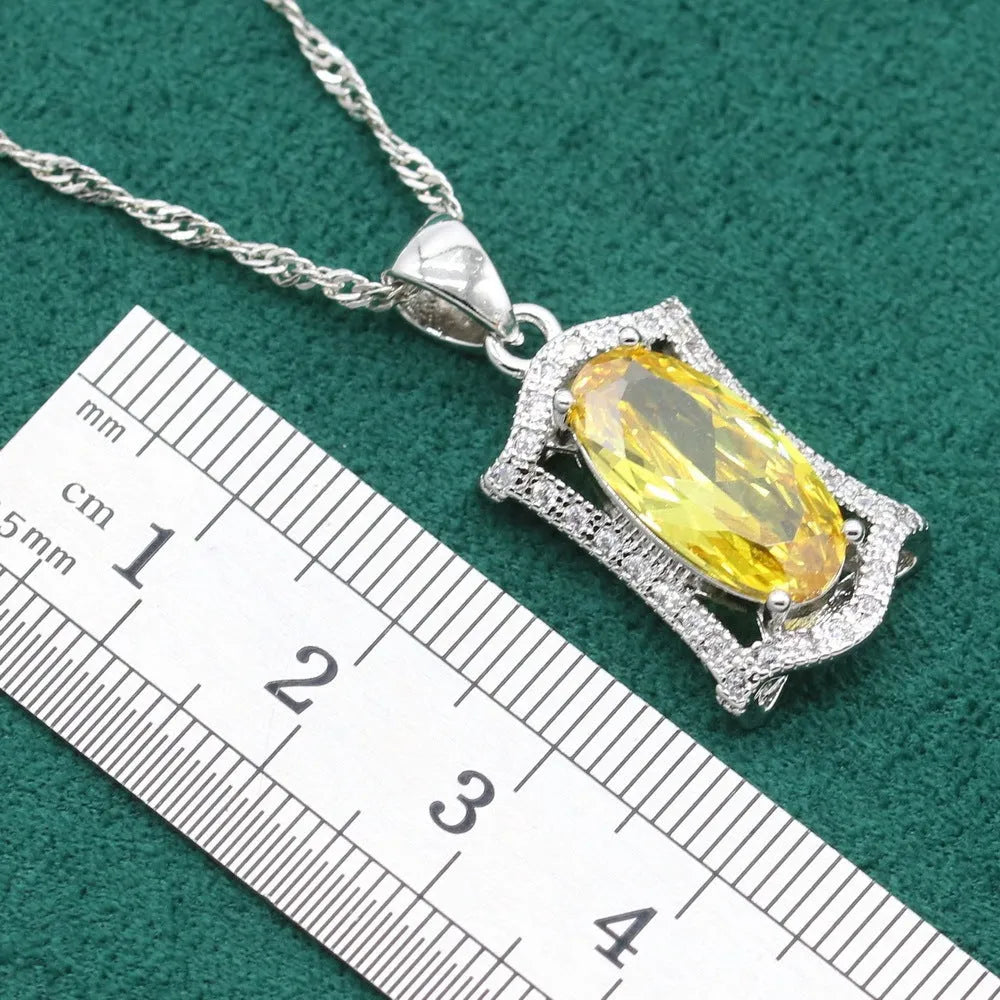Complete zircon jewellery set with snake bone chain necklace, matching earrings, ring and bracelet in yellow or olive colour