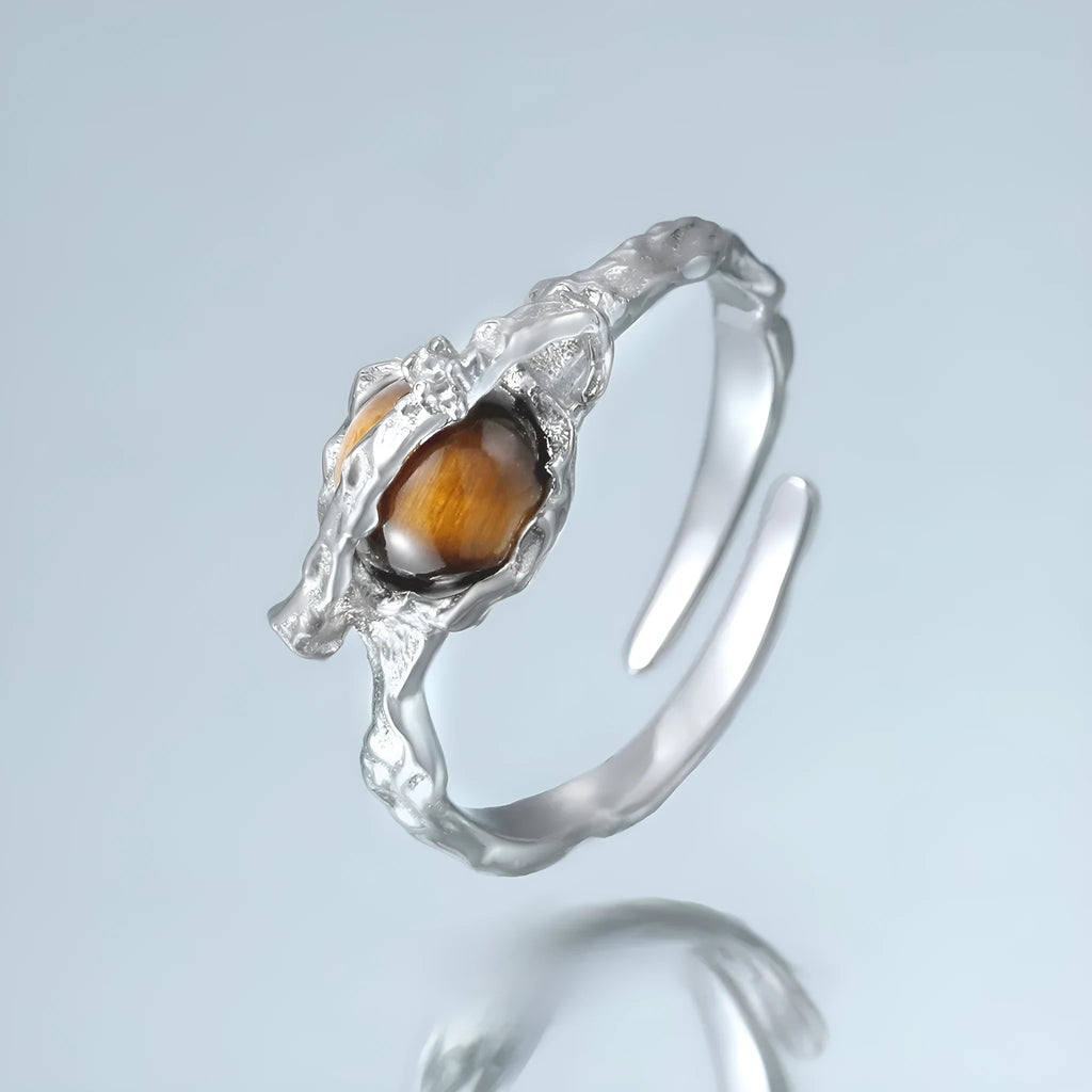 Women's silver Saturn tigereye open ring with adjustable opening and white gold colour finish.