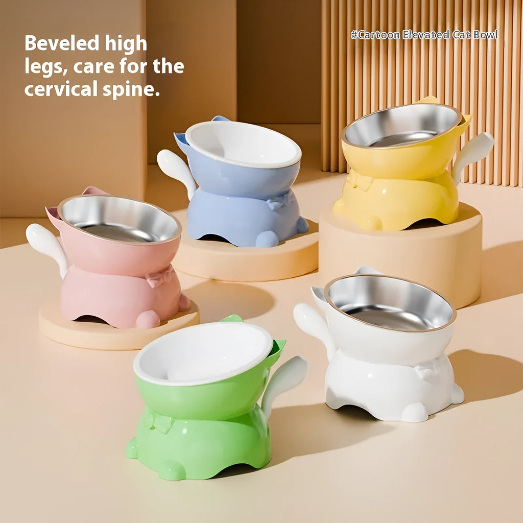 A slanted stainless steel cat bowl in yellow, shown from a side angle on a plain surface.