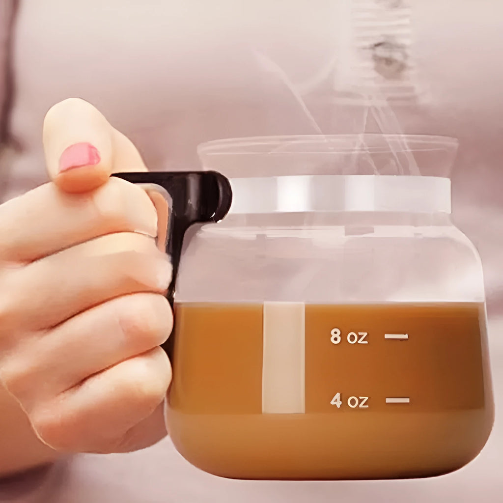 Transparent borosilicate glass coffee maker with grey silicone sleeve cover