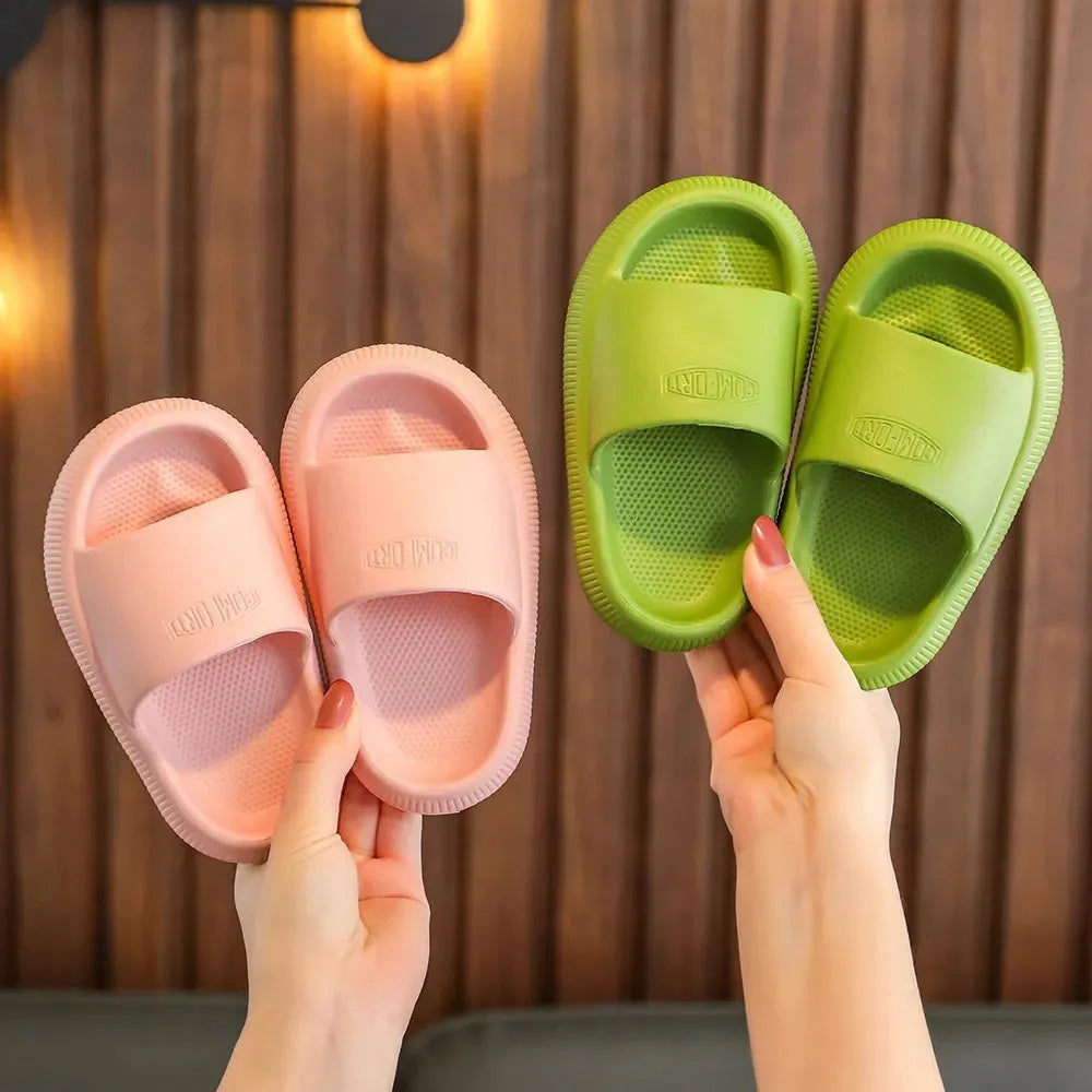 Children's EVA slippers in bright colours with non-slip soles showing size range options