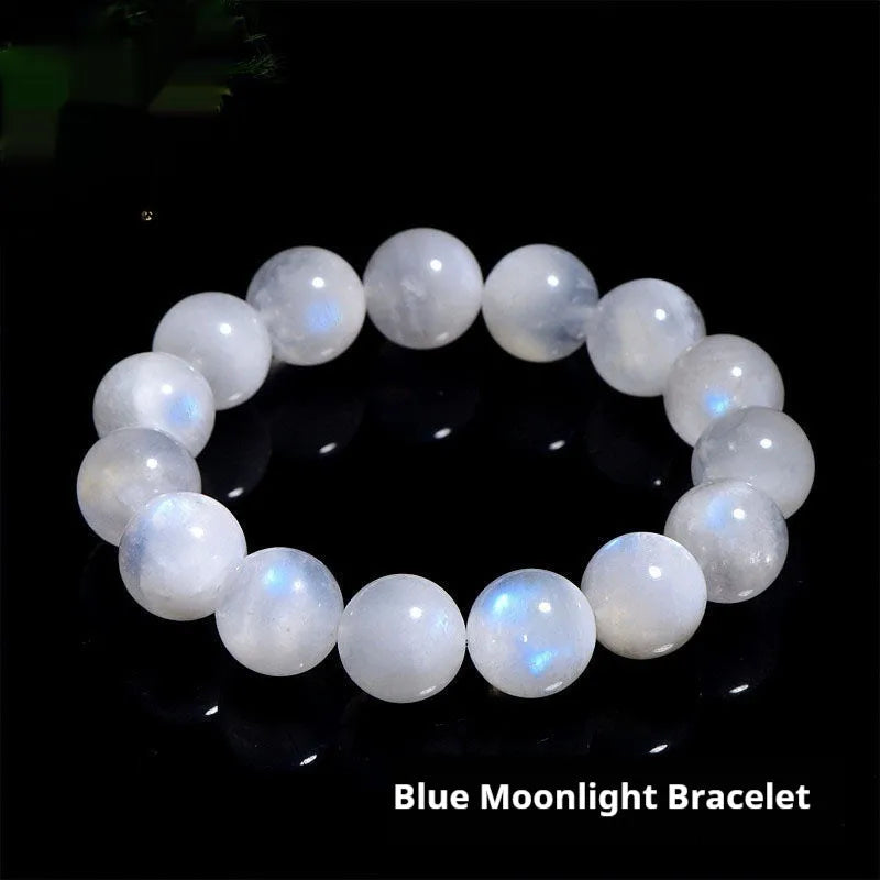Natural blue moonlight moonstone round bead bracelet on wrist showing geometric arrangement