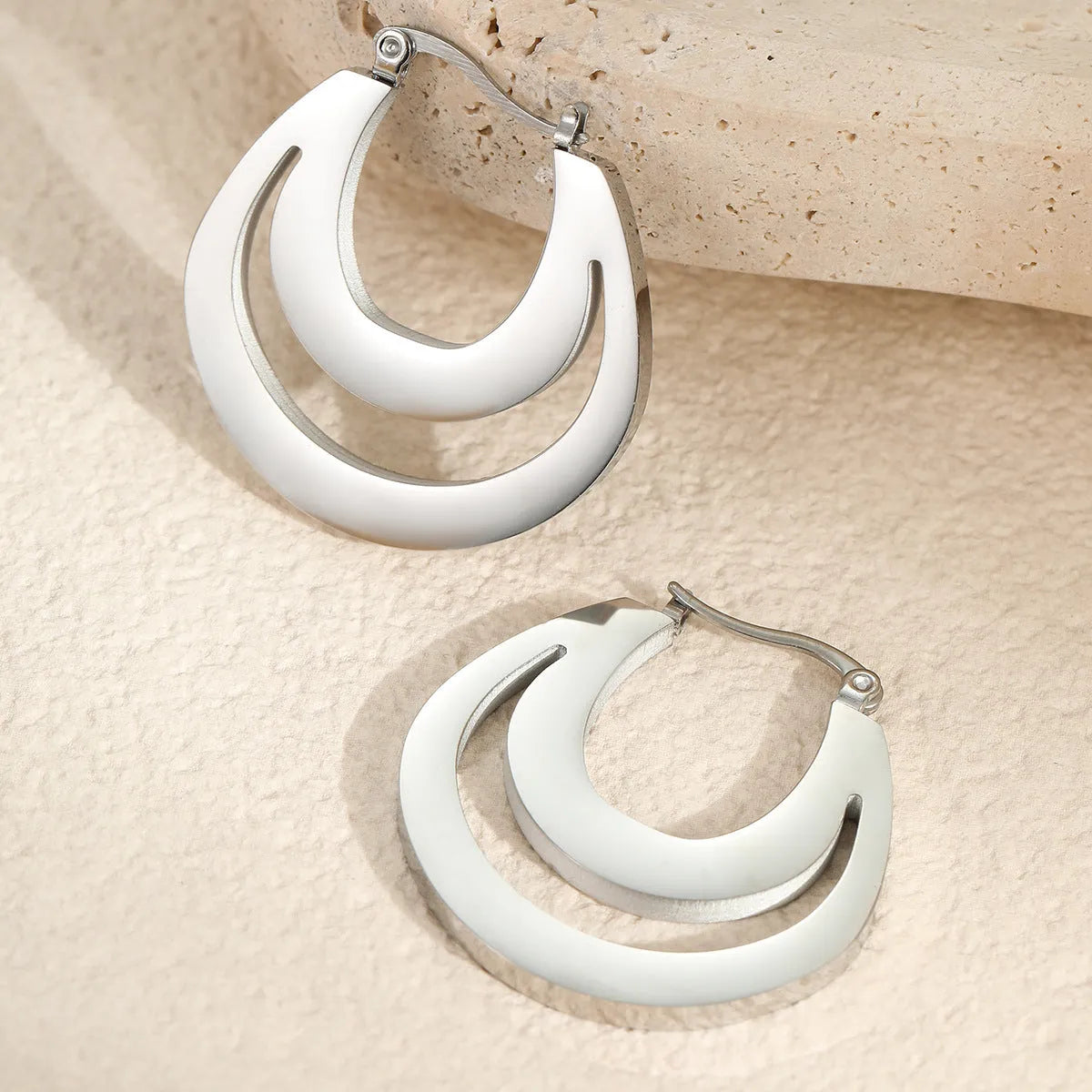 Geometric minimalist French earrings with stainless steel construction and 18K gold electroplating in gold and steel colour options