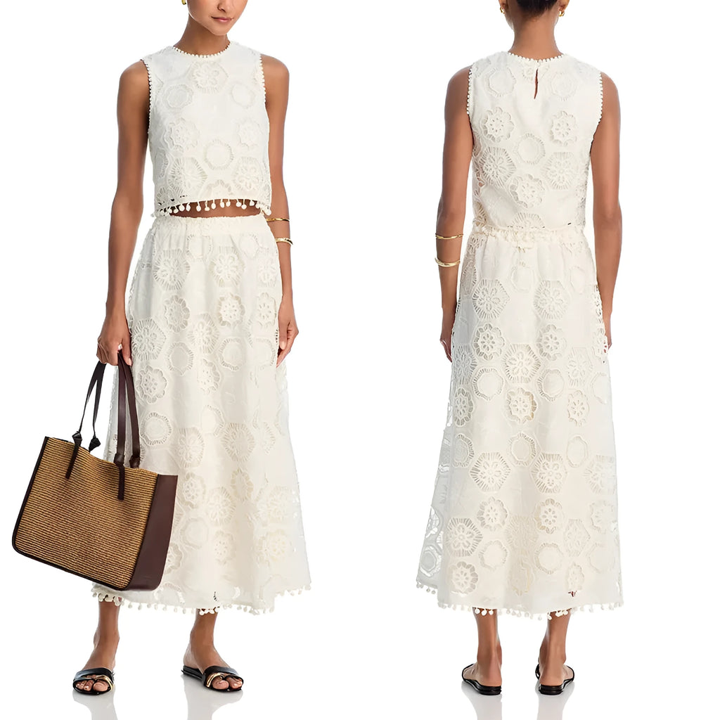 White women's two-piece suit set with embroidered sleeveless top and matching long skirt