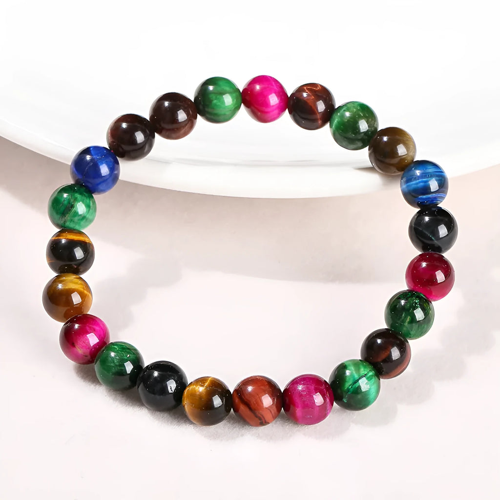 Colourful tiger-eye stone bracelet with geometric and round beads in multiple sizes