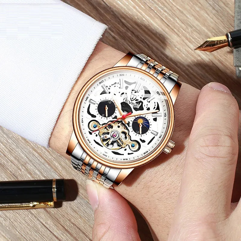 Men's black dial mechanical watch with visible golden tourbillon complication and luminous hands on a metal bracelet.