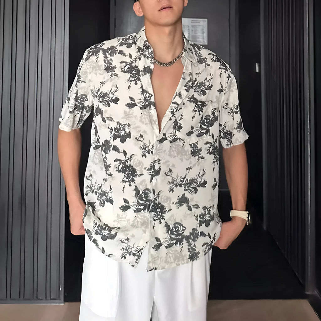 Loose casual short sleeve shirt with a floral print in a cardigan style.