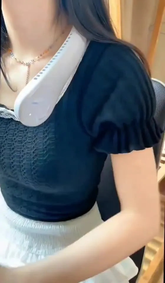 Blue portable bladeless neck fan with adjustable settings and USB charging cable