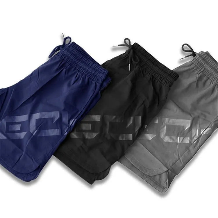 Men's black quick-dry running shorts with knee-length design for summer sports
