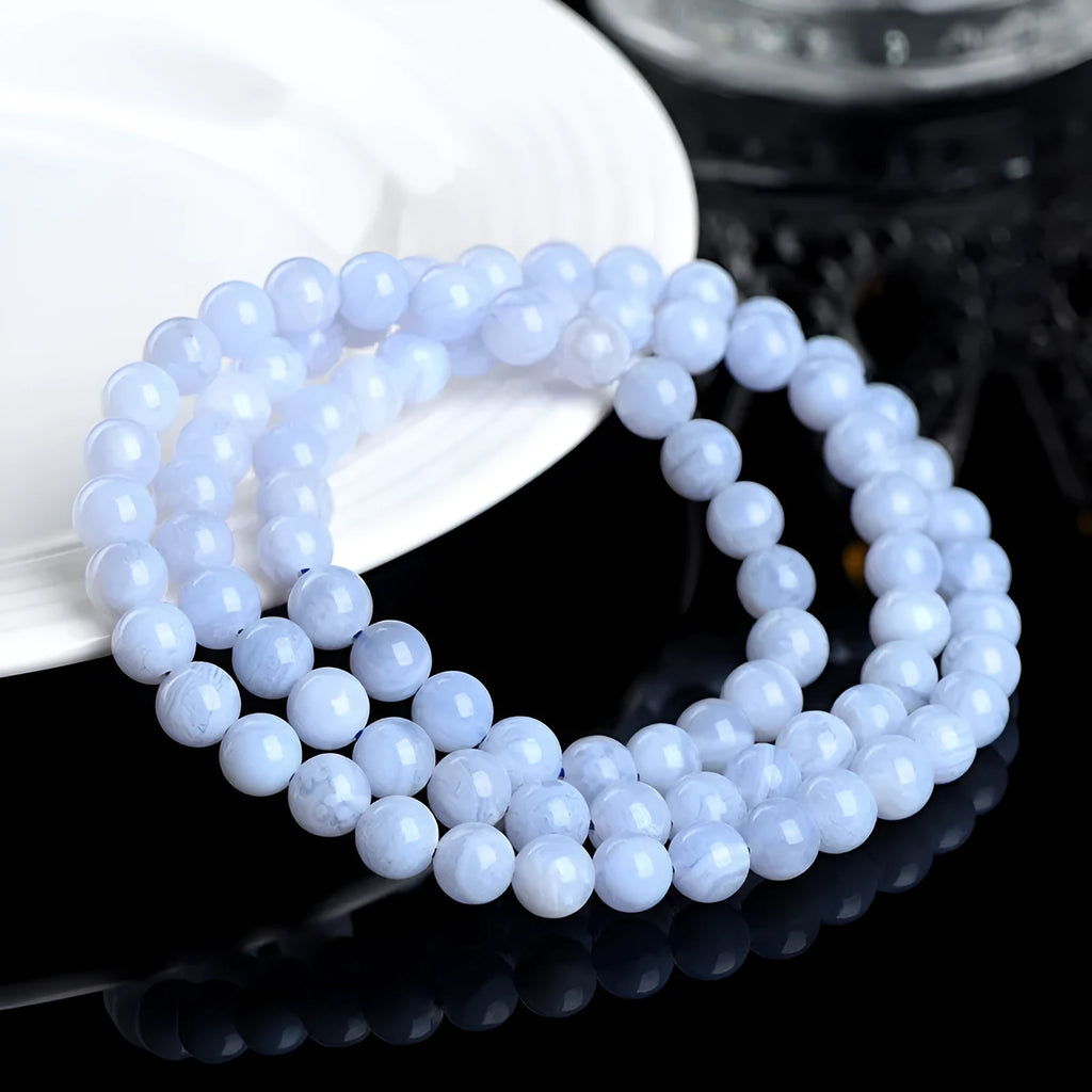 Blue agate multi-circle bracelet with 6-6.8mm beads showing Ruyi pattern and unisex design