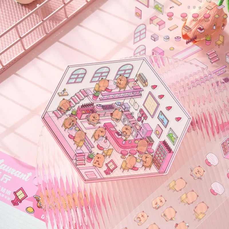 Capabala pre-cut 3D landscaping cartoon stickers on sheet, showing themes like bakery, bookstore, and flower shop.