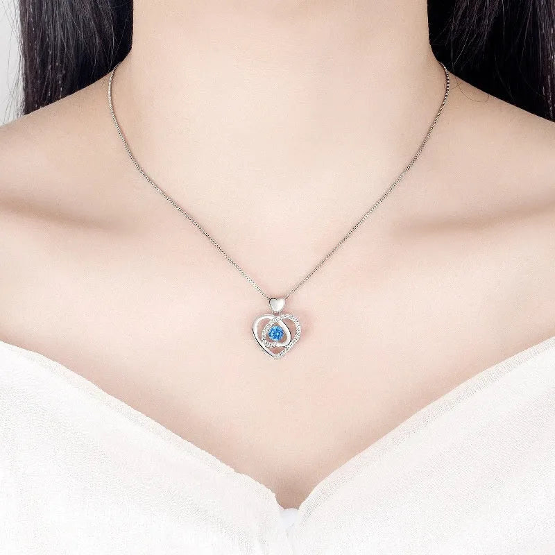 Blue heart necklace and bracelet set with geometric pendant and gemstone accents on copper jewellery