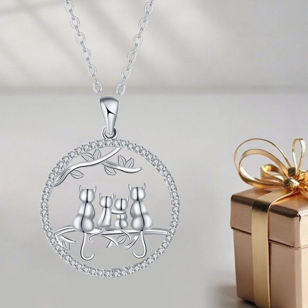 Women's four kitten necklace on copper cross chain with electroplated finish