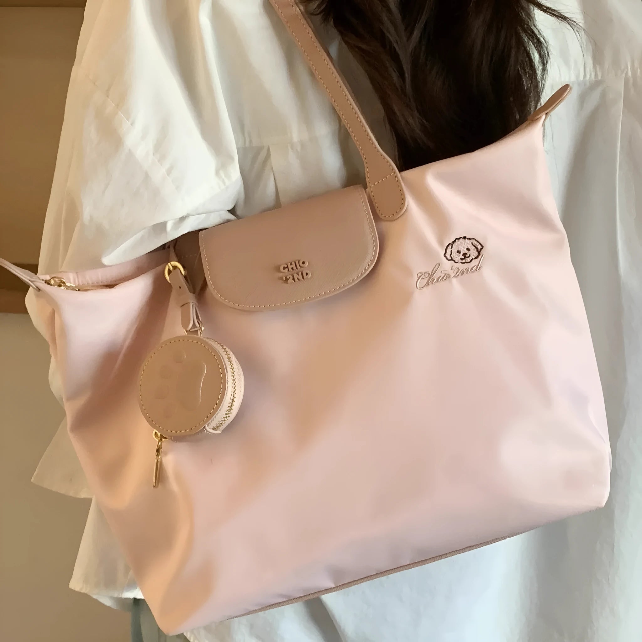 Oxford cloth tote shoulder bag in beige colour showing internal mobile phone pocket and sandwich pocket design