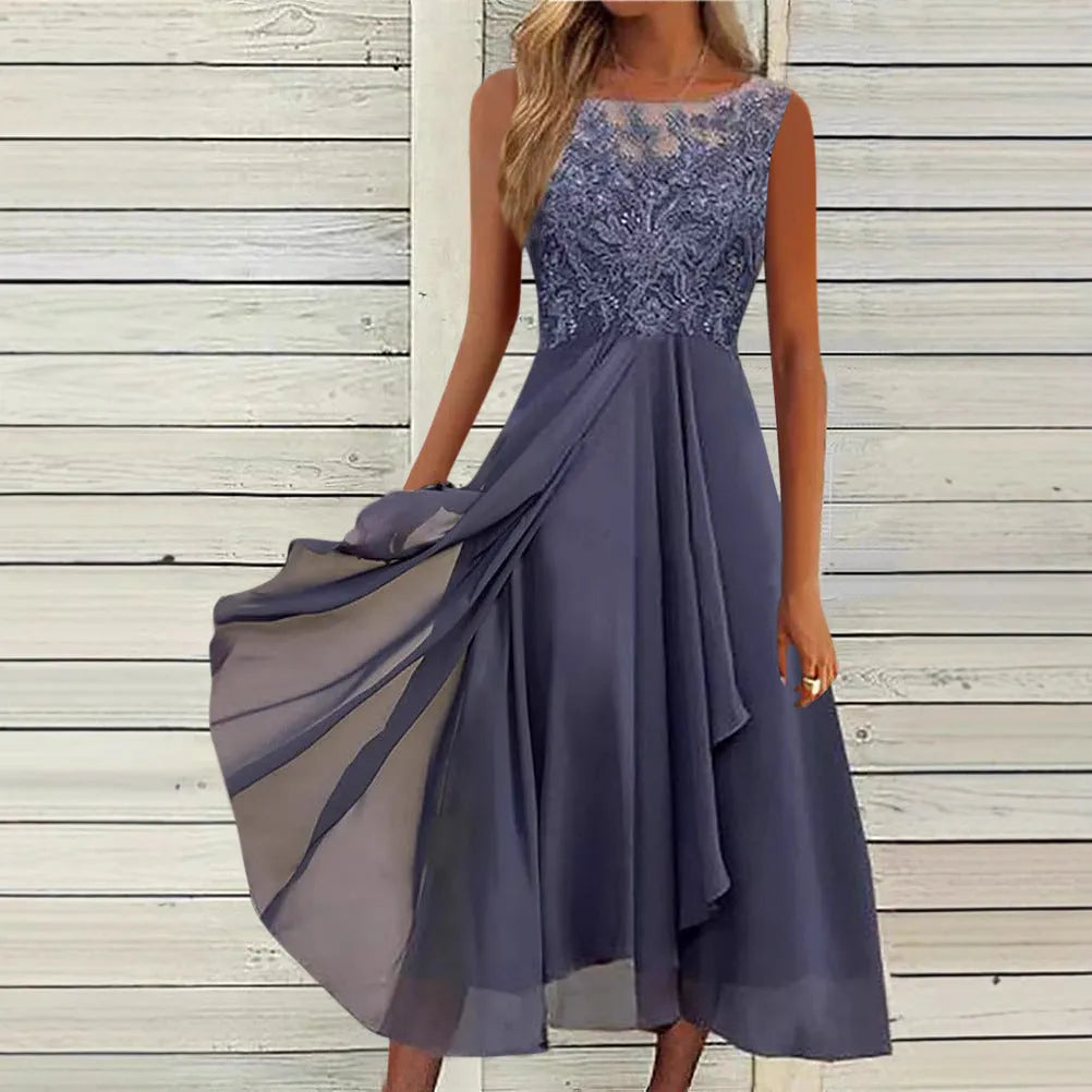 Women's sleeveless chiffon dress with hollow-out lace detail in green, shown on a hanger.
