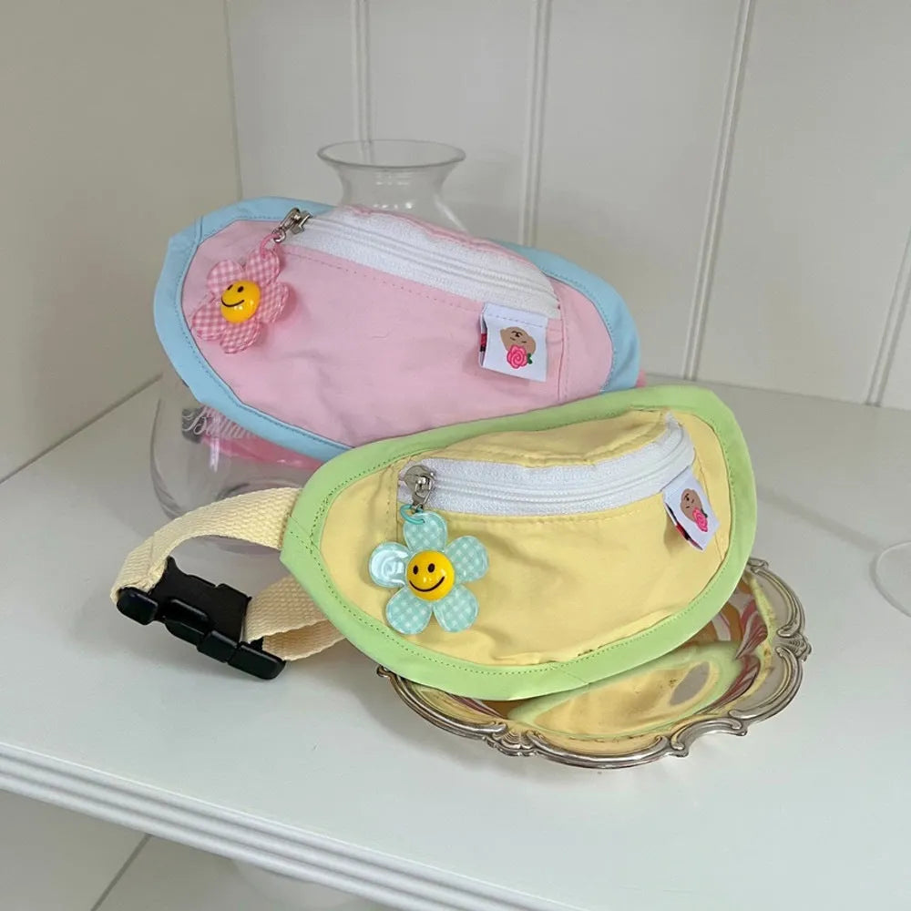 Powder blue backpack-style pet carrier for small dogs or cats, showing mesh panels and adjustable straps.