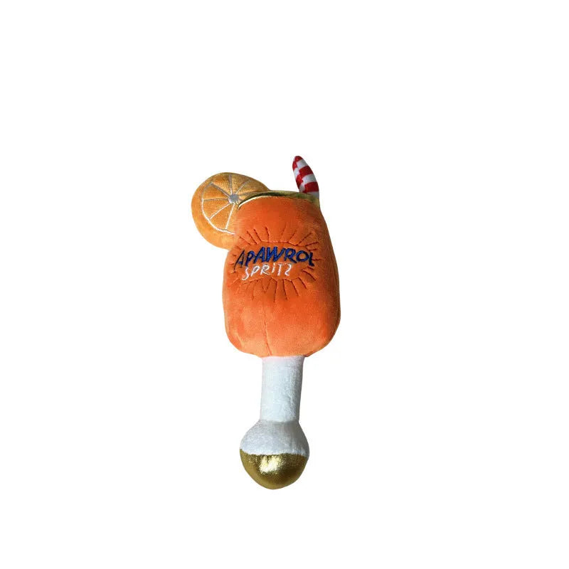 Yellow beer bottle shaped plush dog chew toy with textured surface and squeaker mechanism