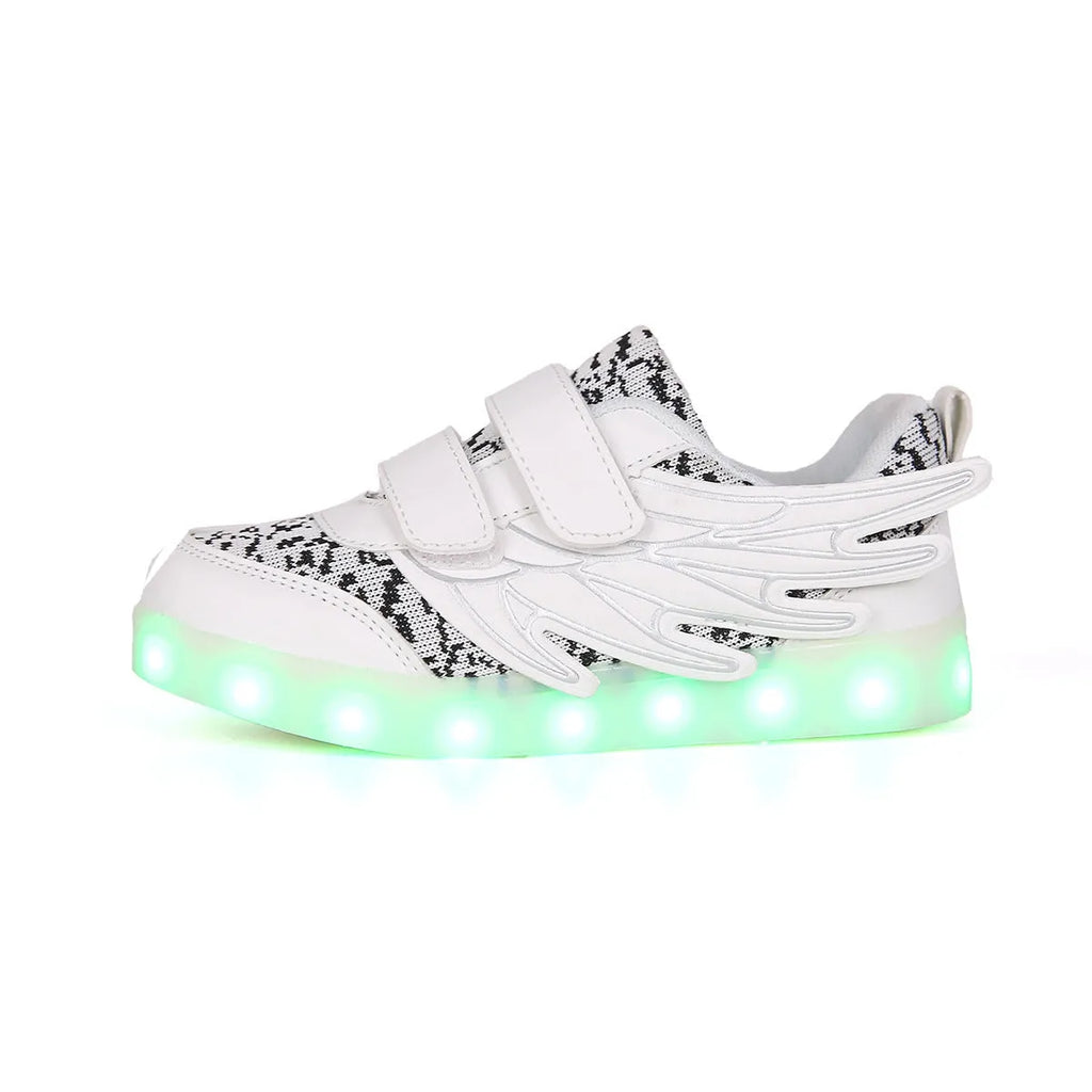 Children's plum red and white LED light up sneakers showing USB charging port and hidden mode switch.