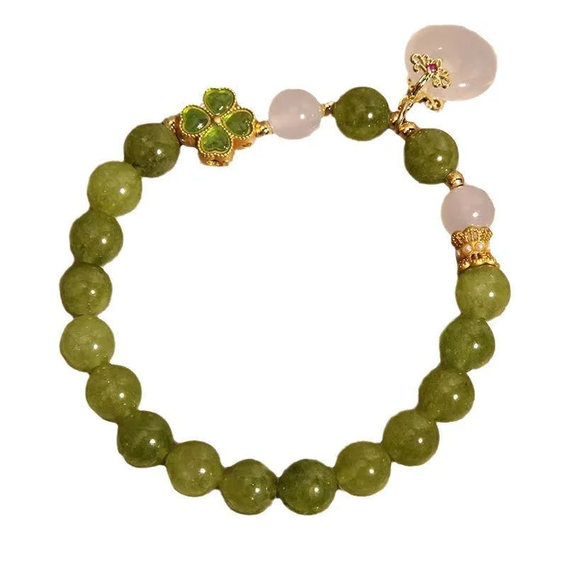 Women's green tourmaline bracelet with a four-leaf clover safety buckle in New Chinese style.