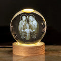 White crystal religious ornament with cross designs on 6cm ball with warm light wood base
