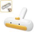 Yellow duck cartoon style portable reusable pet hair remover for furniture and car seats.