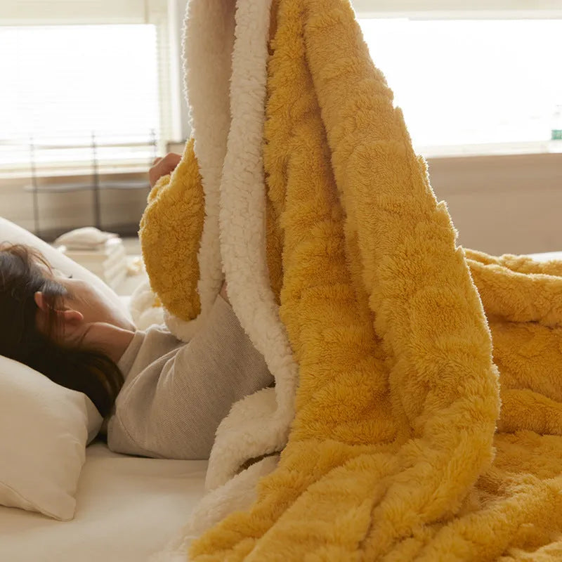 Thick taffeta thermal flannel winter blanket on a bed in tea green colour